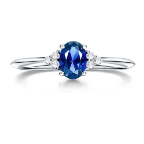 2.5 CT. Oval Sapphire Ring with Trio White Sapphire Accents