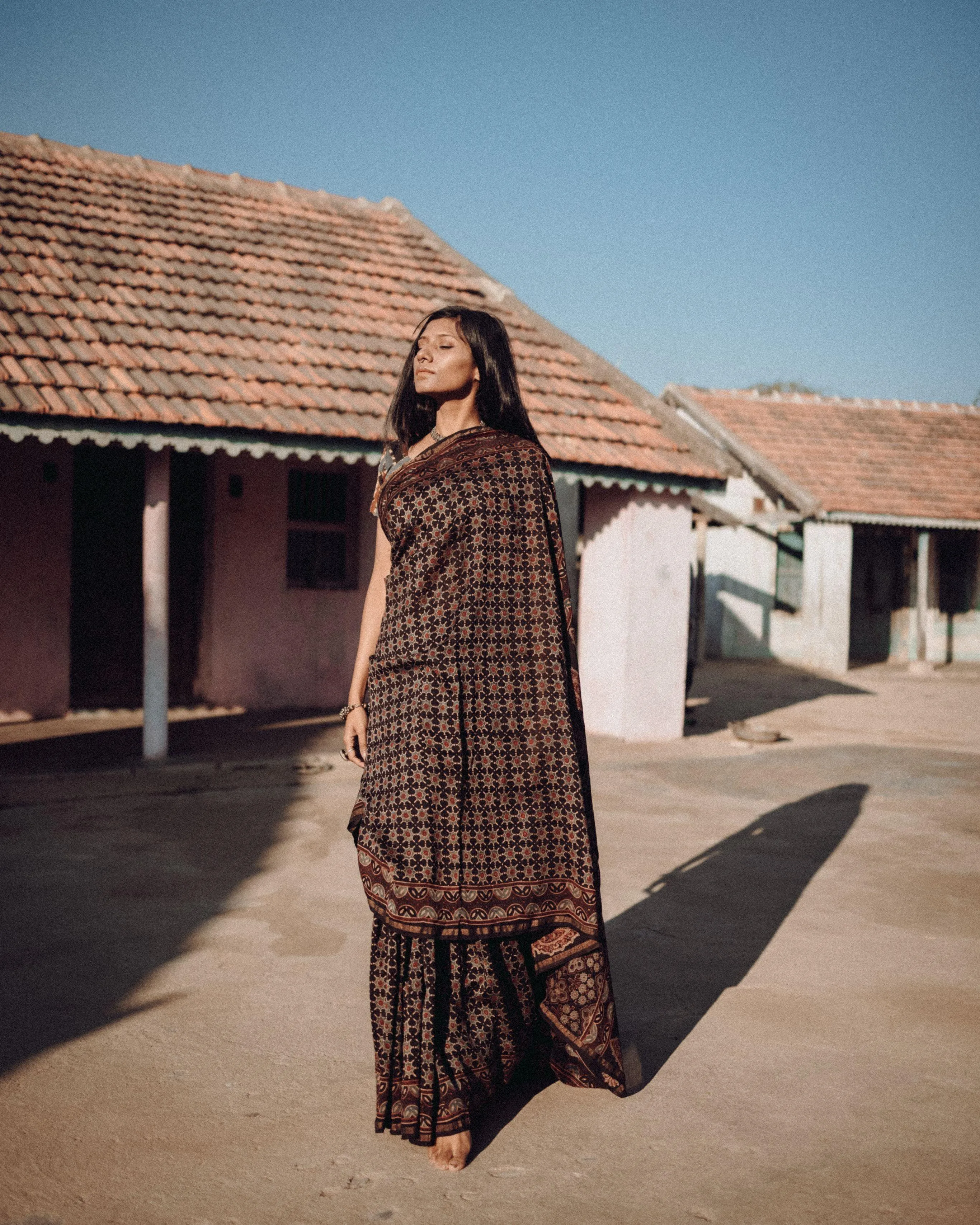 Jharokha -Black silk cotton Ajrakh handblockprinted saree