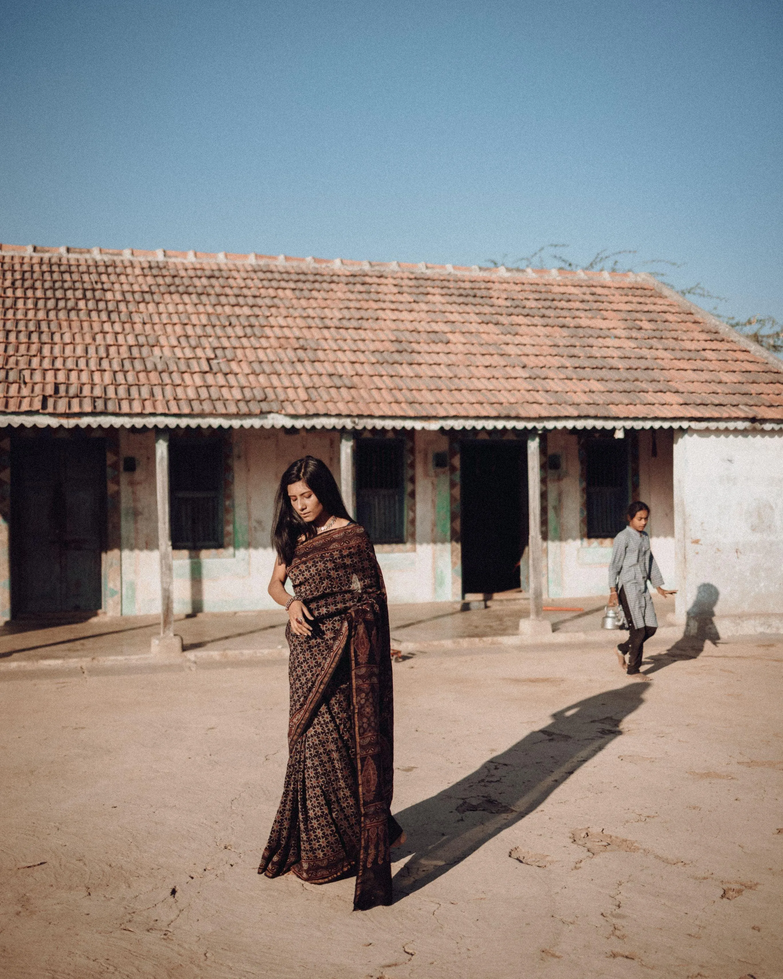 Jharokha -Black silk cotton Ajrakh handblockprinted saree