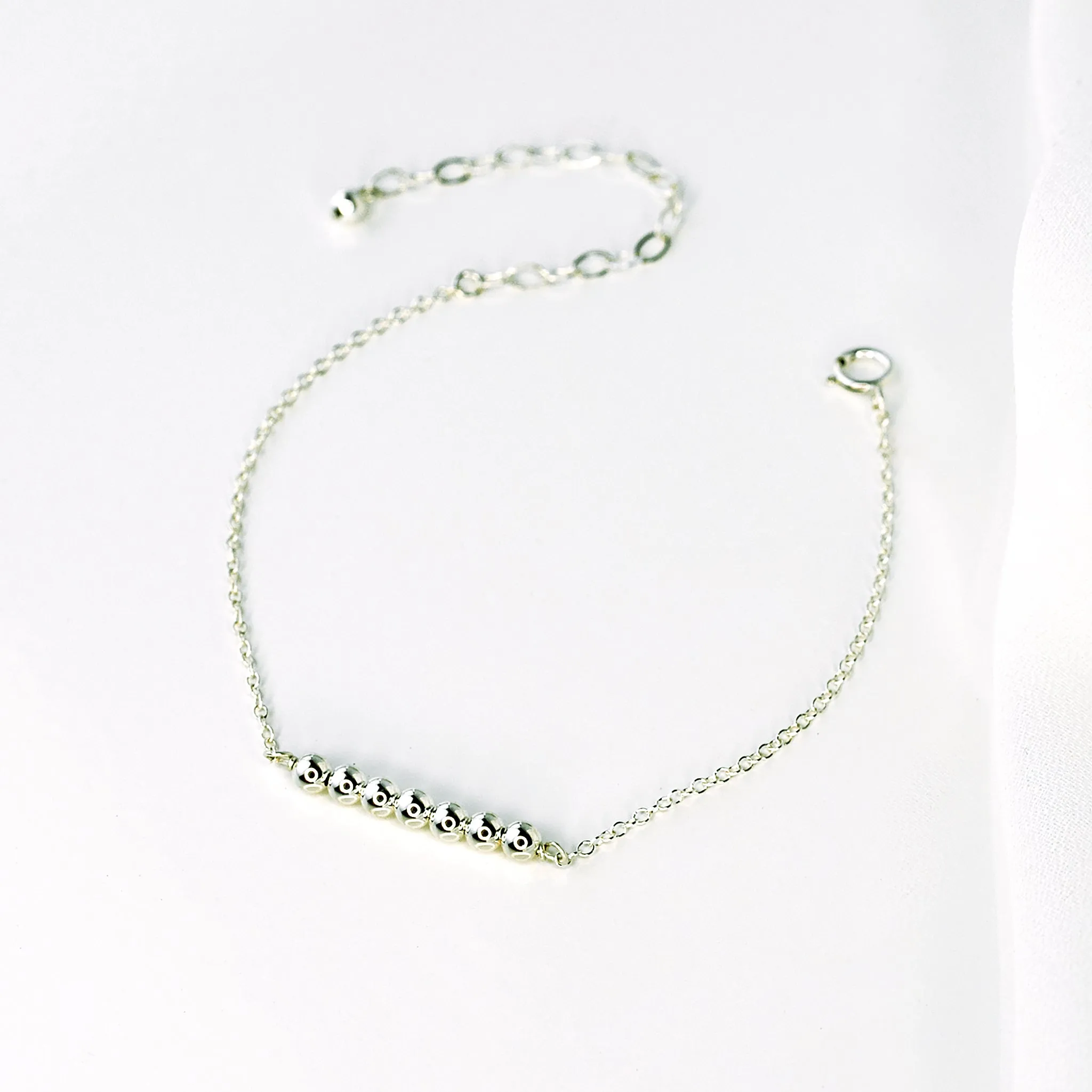 Shimmer Dot Arc Bracelet