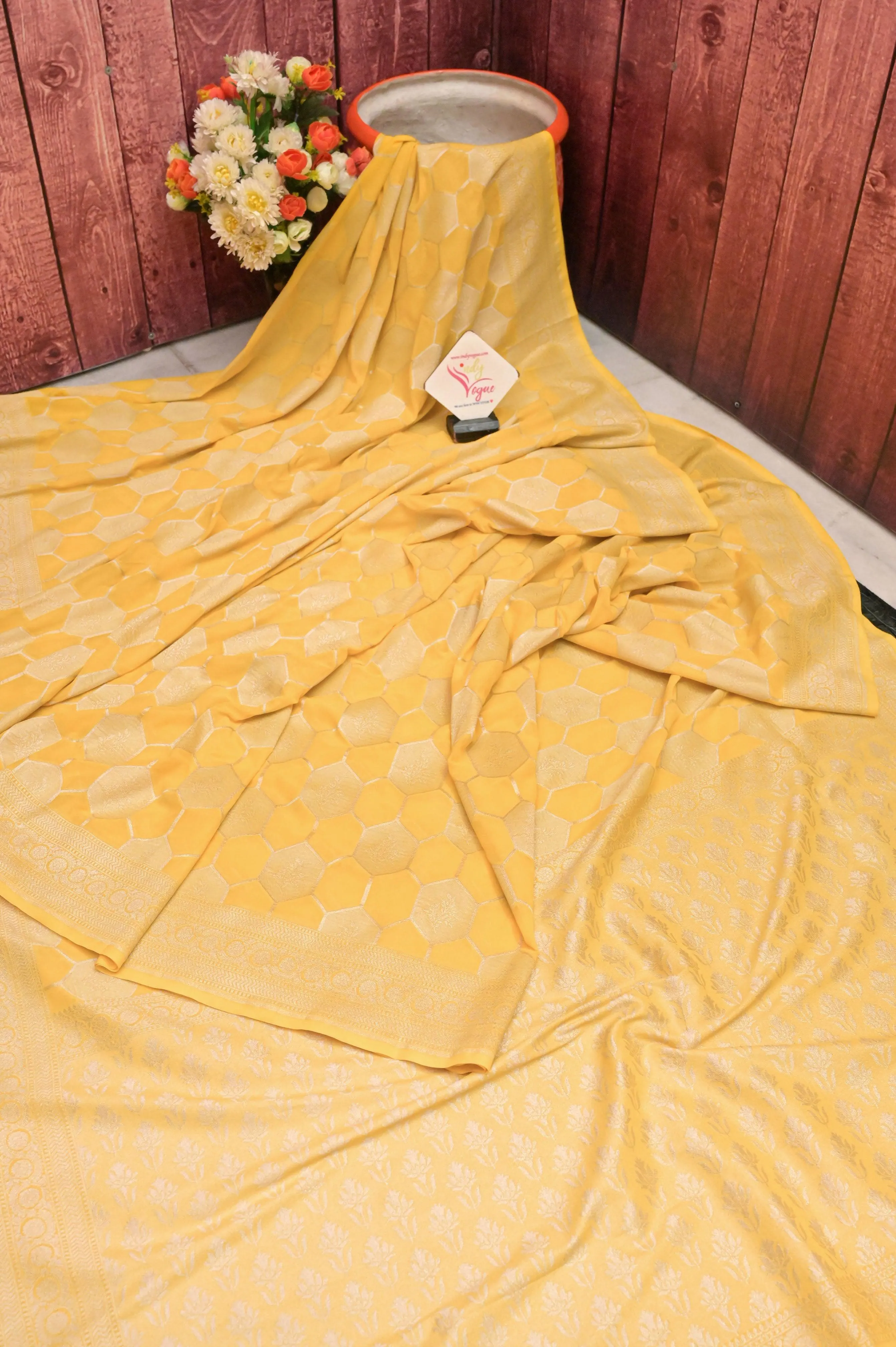 Yellow Color Georgette Banarasi Saree with Silver Zari Work