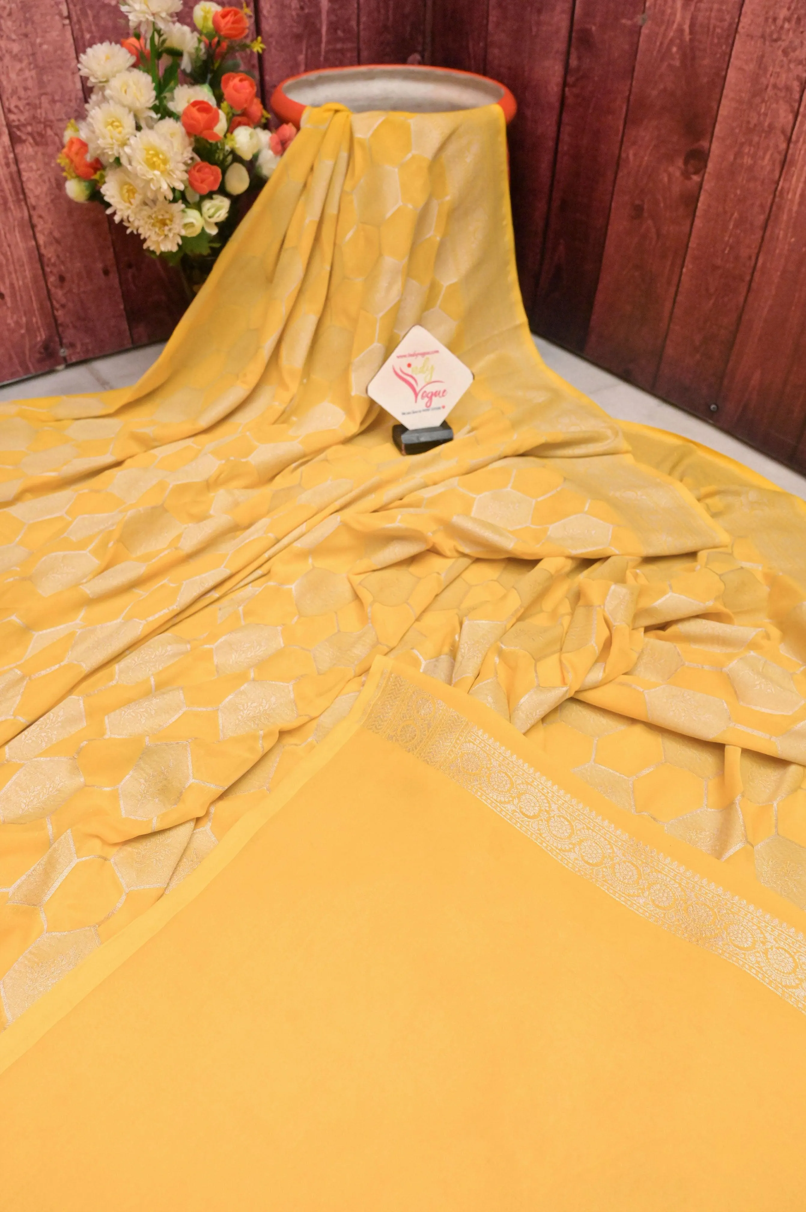 Yellow Color Georgette Banarasi Saree with Silver Zari Work